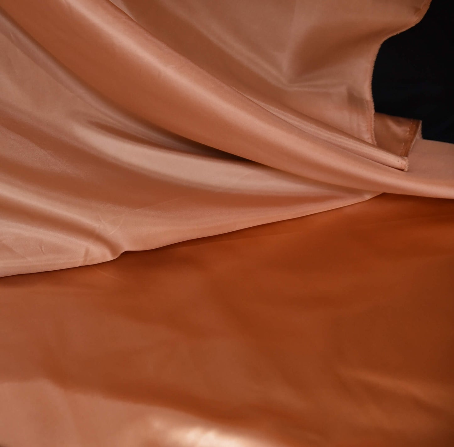Peach shiny cloth satin fabric